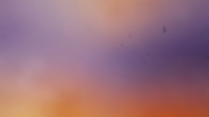 : A dreamy gradient blending orange and lavender tones, softened with a blur effect for a tranquil and ethereal abstract design.