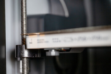 Selective focus on a 3d printer height screw used to change bed elevation