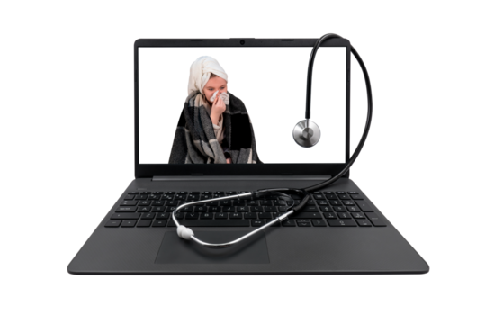 Laptop and medical stethoscope on a transparent background. On the laptop screen - a girl with cold symptoms blows her nose into a paper handkerchief