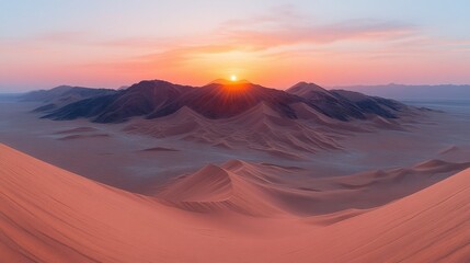 Naklejka premium Breathtaking desert sunrise landscape photography. Golden hour light illuminates vast sand dunes and majestic mountains.