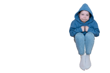 Girl in blue hoodie sitting on the floor with sad face on transparent background. Concept of kidnapping, fear, fright and loneliness