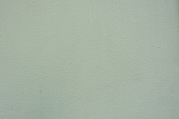 Textured wall with subtle color variations in indoor space