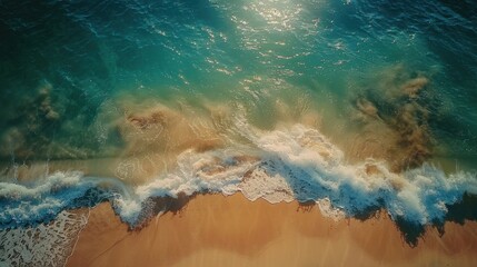 Drone shot of a beautiful tropical beach. The clear blue sea sparkles under the sun, waves gently rolling onto the sandy shore. A perfect scene