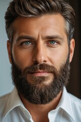 Obraz premium arafed man with a beard and a white shirt looking at the camera