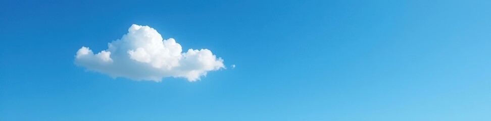 Fototapeta premium Single, bright white cloud floating in a deep blue sky , calm, design