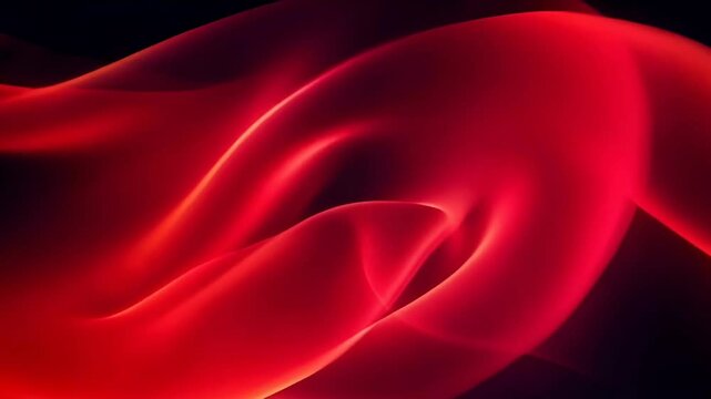 L&iacute;neas onduladas abstractas en rojo y naranja sobre tejido de seda semitransparente, creando un fondo din&aacute;mico para video.