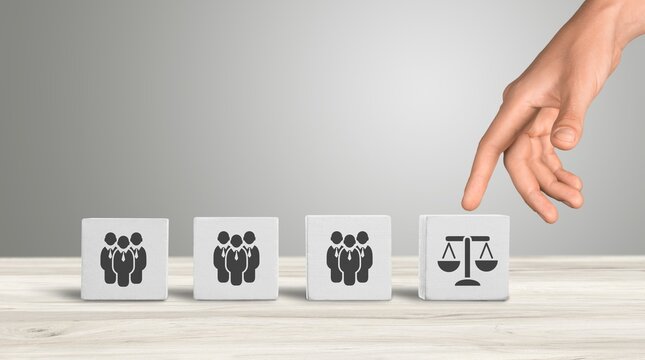 Employment laws and regulations on wooden cubes. Business ethics.