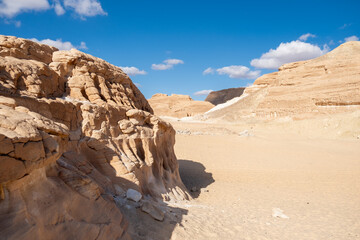 Stunning landscape of the Sinai desert in Egypt showcasing unique rock formations under a bright blue sky