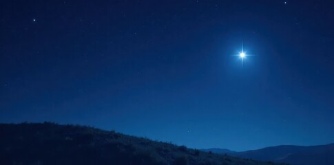 Naklejka premium A lone star shining brightly against a dark blue sky, , star, sky
