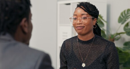 Smiling corporate executive conducts job interview with male candidate for office worker, accepts...