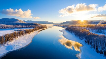 Fototapeta premium Aerial Scenic View of Winter Landscape with River and Snow-Covered Mountains