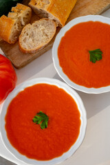 Famous vegetables soup from Cordoba, Andalusia salmorejo served cold in restaurant for lunch as starter dish close up
