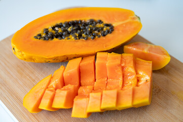Ripe sweet tropical papaya fruits ready to eat, exotic food
