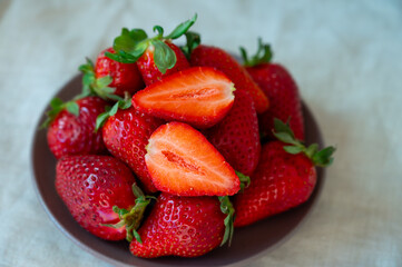 New harvest, plate with bio ripe red sweet strawberry from Tenerife, Canary islands, Spain,...
