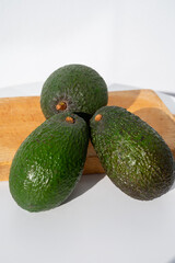 Green ripe avocado from organic avocado plantation - healthy food