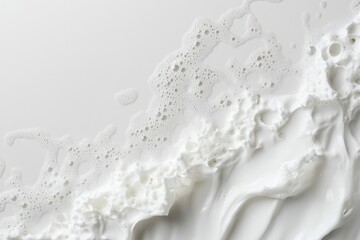 White creamy substance with bubbles creates abstract texture