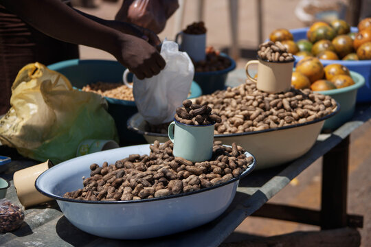 African street vendor raw peanuts and monkey oranges sold on the side of the road in Botswana