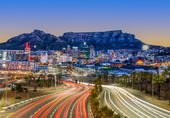 Highway Light Trails Leading to the Vibrant, Lit-Up City of Cape Town at Night, South Africa