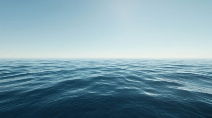 Fototapeta premium A tranquil sea with gentle waves rolling onto the shore, deep blue water meeting the clear sky, ample copy space.