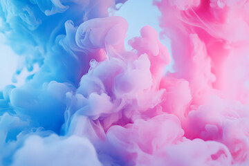Obraz premium A colorful blend of pink and blue smoke creating an abstract visual effect.