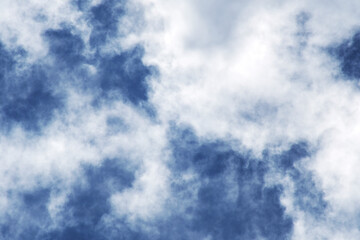 Heavy rain cloud with blue sky as background