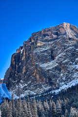 Beautiful panoramic view to the Sellaronda - the ski circuit around the Sella group in Dolomites, Italy - Badia, Gherdeina, Fascia. Extraordinary snowy peaks of the dolomites, southern Alps.