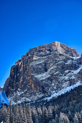Beautiful panoramic view to the Sellaronda - the ski circuit around the Sella group in Dolomites, Italy - Badia, Gherdeina, Fascia. Extraordinary snowy peaks of the dolomites, southern Alps.