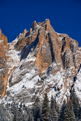 Beautiful panoramic view to the Sellaronda - the ski circuit around the Sella group in Dolomites, Italy - Badia, Gherdeina, Fascia. Extraordinary snowy peaks of the dolomites, southern Alps.