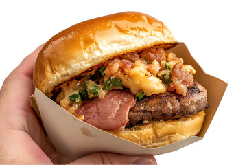 Hand holding a gourmet burger, close-up view, appetizing meal