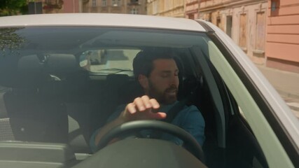 Driver man Caucasian male businessman customer guy driving own car steering wheel buy new automobile test drive in city road travel rent vehicle driveway navigator transport credit purchase smiling