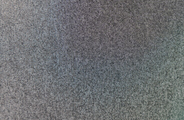 Close-up view of a gray textured fabric.