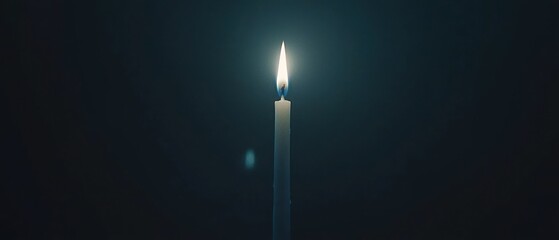 A Single Candle in the Dark: A Symbol of Hope and Remembrance
