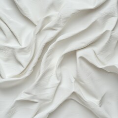 White fabric texture background with soft folds and delicate patterns.