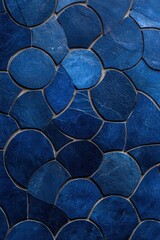Abstract blue stone tile background with circular pattern.