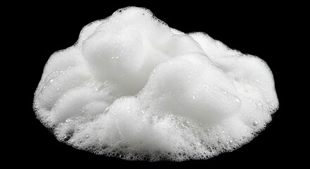 Pile of White Foam or Lather Against a Stark Black Backdrop