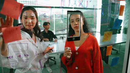 Portrait of group of professional diverse start up business team present marketing plan to...