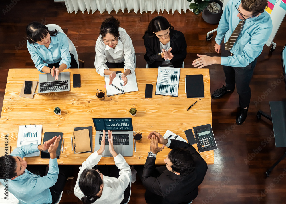 Poster panorama top view diverse group of business analyst team analyzing financial data report paper on me