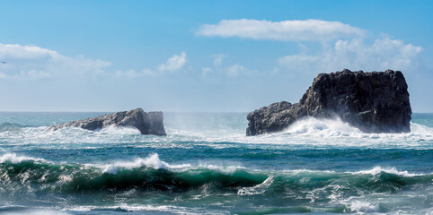 Spectacular splashes explode as wind driven waves strike rock 2 in Piedras Blancas State Marine Reserve.