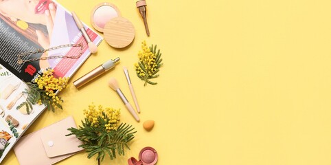 Decorative cosmetics with necklace, magazine and mimosa flowers on yellow background with space for text