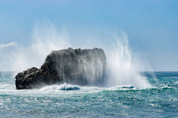 Spectacular splashes explode as wind driven waves strike rock 2 in Piedras Blancas State Marine Reserve.