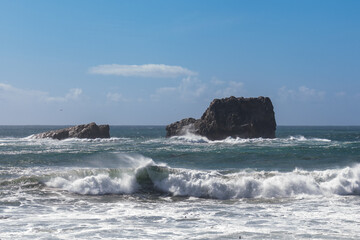 Spectacular splashes explode as wind driven waves strike rock 2 in Piedras Blancas State Marine Reserve.