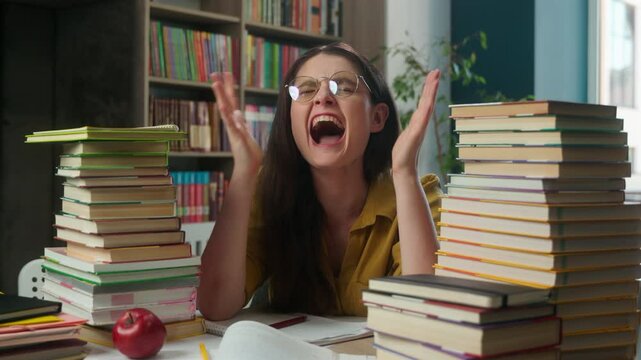 Stressed annoyed Caucasian woman girl high school student teacher female write exam hard education difficult learning studying reading books library university college exhausted tired overwork scream