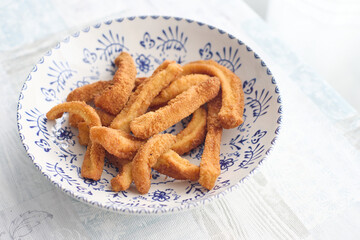Classic Spanish tapas dish. Calamari cut into strips, coated in breadcrumbs, and deep fried
