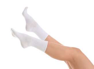 Legs of young woman in stylish socks on white background