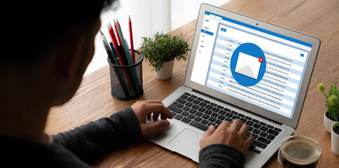 Email notification message showing on computer screen snugly. Digital marketing message information text from business to customer client