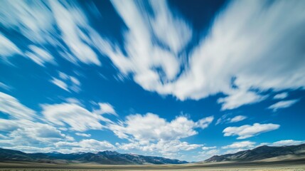 Moving Clouds Over Mountain Valley Landscape