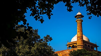 Majestic Mosque Minaret Against Vivid Blue Sky