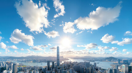 Fototapeta premium Aerial view of vibrant cityscape with skyscrapers and bright sun