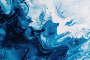 Obraz premium Abstract blue and white fluid acrylic paint swirls.