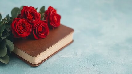 Romantic Still Life: Red Roses Resting on an Elegant Brown Leather-Bound Book